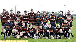 READY FOR ACTION: Oldham Service Area under-13s line up before their match against Salford. 