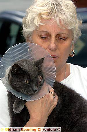 ATTACKED . . . Barbara with Milo.
