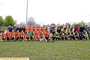 ON PARADE: Oddies captain Mark Hill and Coppice United counterpart Kamell Ahmed line up before the Oldham Sunday League President’s Trophy final at Chadderton FC’s Broadway ground. Oddies beat their Jack Abbott premier division rivals on penalties after the final had finished at 4–4.  