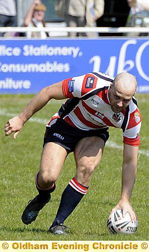 Hat-trick hero Andy Ballard scores the second of his tries