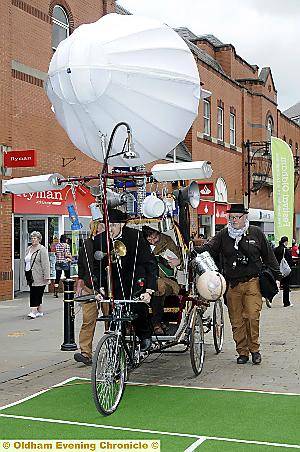 WHEELY good fun . . . his Lordship (Gordon Banks and Olaf Treebob) with Robert Moutrey on the Rickshaw Airship 