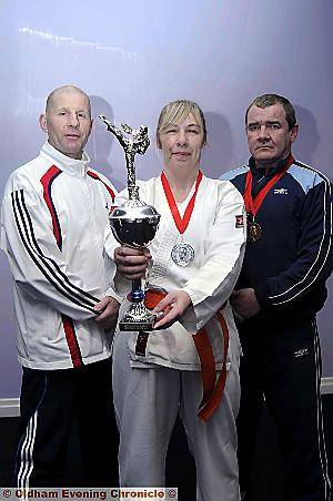 Coach Keith Cockburn (l), with Jackie Jordan and Charlie Mitchell. Coach Keith Cockburn (l), with Jackie Jordan and Charlie Mitchell.