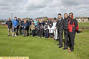 FORMER European Tour winner Paul Eales and top coach Kendal McQuaid were on hand to offer free coaching at a golf taster session at Bishop’s Park pitch and putt, Grains Bar. Some of those who took part are pictured with (foreground left to right) Kendal McQuaid, Paul Eales and organiser Jamie Edwards. 