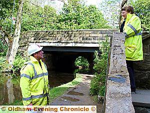 Construction manager Steve Woodcock (above) discusses the Brownhills bridge project with Melanie Adamson, from the Oldham Unity Partnership 
