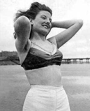 PIN-UP . . . Joyce shows off her figure on the beach in Blackpool 