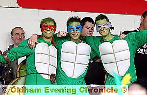 TURTLE power . . . The Teenage Mutant Ninja Turtles add a splash of colour to the proceedings at Walsall 