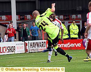 TIMELY TONIC: Deane Smalley smashes home Athletic’s equaliser just before half-time. 