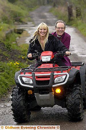 THE Bishop has a go on a quad bike with church council member Sarah Barker 