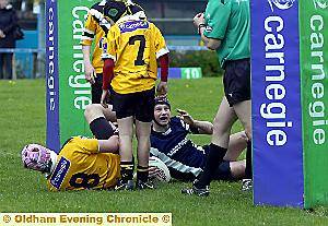 IS THAT A TRY, SIR? Saddleworth’s Ryan Maneely seeks confirmation of a try.