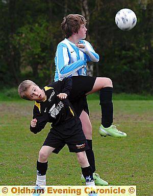 THAT’S MINE: Callum McEvilly of Crompton House Year Sevens, wins the ball 