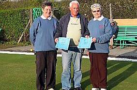 PASS masters: Irene Muschamp, captain, and secretary Kathryn Jackson are presented with their certificates by Bill Bezy, vice-president of the Crown Crown Bowls Association of Greater Manchester 