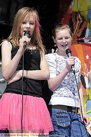 Naomi Hetherington (12) and Anna Brown (12) belt out a few numbers Naomi Hetherington (12) and Anna Brown (12) belt out a few numbers