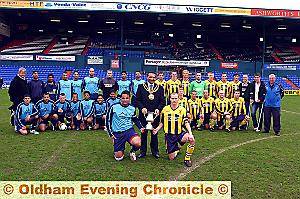 ON PARADE: Coppice United captain Kameel Ahmed and Chaddy End FC skipper Lee Deakin flank Mayor of Oldham, councillor Shoab Akhtar before the Challenge Cup final at Boundary Park. 