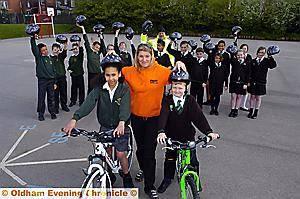 Pictured are pupils with the donated helmets and (front, from the left) Talia Corbett, NCA team leader Helen Butcher and Charlie Quarmby.
Pictured are pupils with the donated helmets and (front, from the left) Talia Corbett, NCA team leader Helen Butcher and Charlie Quarmby.