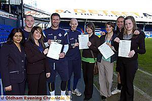 Students receive certificates from Latics players. From left, Tasneem Kausar-Javaid, tutor, Deane Smalley, Melissa Valentine, Sean Gregan, Danny Whittaker, Robyn Williams, Helen Wilson, Lee Duxbury and Ashleigh Winterburn Students receive certificates from Latics players. From left, Tasneem Kausar-Javaid, tutor, Deane Smalley, Melissa Valentine, Sean Gregan, Danny Whittaker, Robyn Williams, Helen Wilson, Lee Duxbury and Ashleigh Winterburn