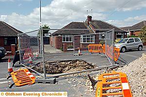 RESIDENTS are up in arms over this hole in the road at Dorset Avenue, High Crompton
RESIDENTS are up in arms over this hole in the road at Dorset Avenue, High Crompton
