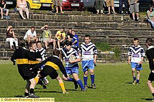ON THE CHARGE: Matt D’Adamo, of Saddleworth School, surges forward. 