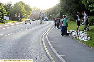 TRIBUTE . . . Chris Dale’s school friends lay flowers