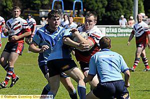 HARD YARDS: Oldham’s Mark Smith charges forward. 