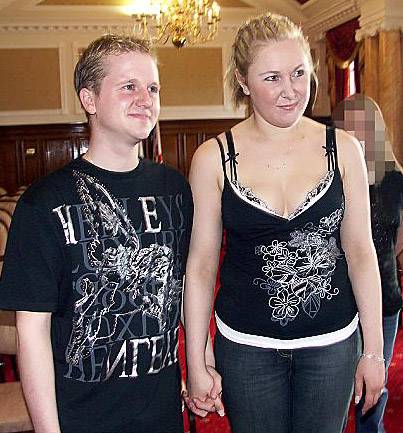 BLUSHING bride ... Ashley Baker and Emily Horne on their wedding day at Chadderton Town Hall 