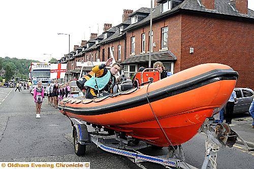 Chadderton Sub Aqua Club hit dry land for the parade 
To buy this picture, call us on 0161 622 2130