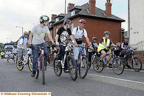 Oldham Cycle Club have a wheely good time
To buy this picture, call us on 0161 622 2130