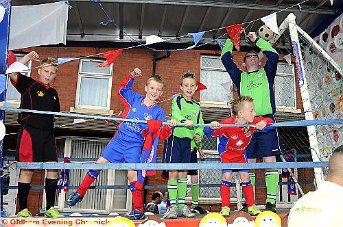 Chaddy Grasshoppers shoot and score with a wave for passers-by 
To buy this picture, call us on 0161 622 2130