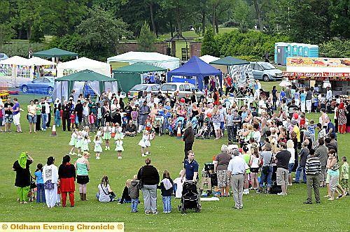 Crowds watch dancing in the park
To buy this picture, call us on 0161 622 2130