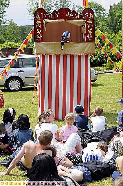 Tony James's Punch and Judy entertained the youngsters 
To buy this picture, call us on 0161 622 2130