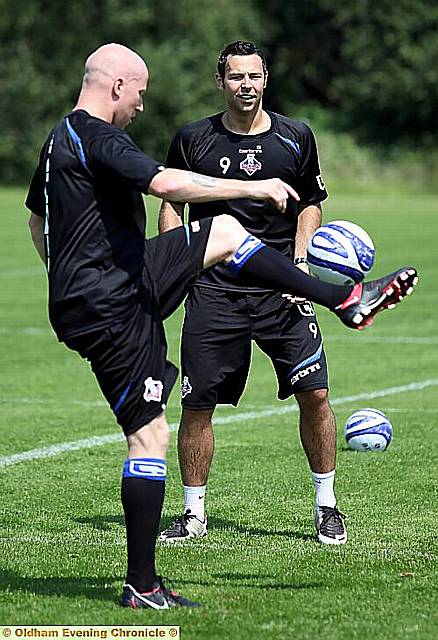 FAMILAR FACE: Lee Hughes joins in training with newcomer Pawel Abbott 
