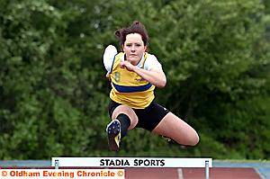 UP AND OVER: Champion of the Year 10 hurdles, Hulme’s Lauren Cunliffe. 