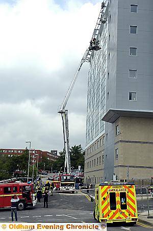 UP in the sky . . . roads are sealed off as the rescue gets under way