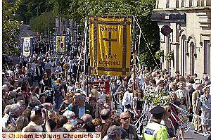 CROWDS lined the streets to see Sacred Heart and oher local churches 