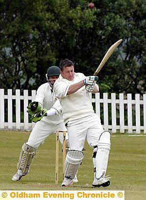 ON THE ATTACK: Michael Schofield pulls the ball away — only to be caught by Miles Barnes. 