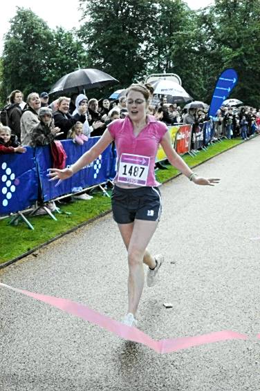 RACE of her life: 1st to finish, 24-year-old Amy James 