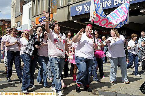 ON the march . . . Pride parade through Oldham town centre