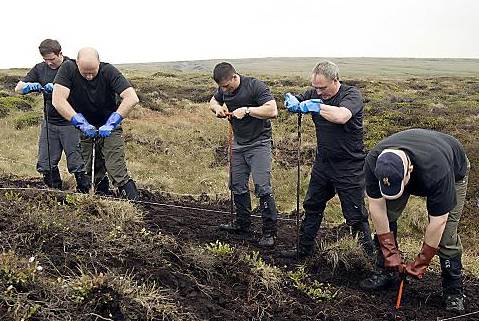 POLICE search Saddleworth Moor for the body of Keith Bennett, murdered by Hindley and Brady 
