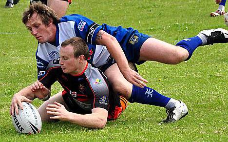 PILING UP THE POINTS: Full-back Paul O’Connor increases Oldham’s advantage at Derwent Park. 