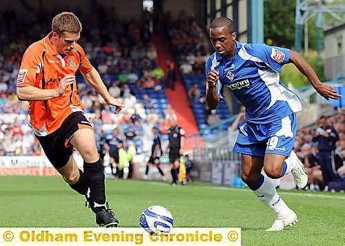 RUNNING MAN: Athletic substitute Darren Byfield looks for a way round the Stockport County defence. 
