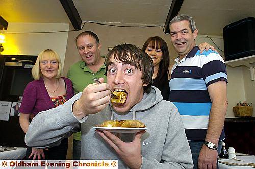 Judge Frankie Byrne is pictured testing a rag pudding under the watchful eyes of, (from left) contestant Elaine Halliday, landlord Dave Giblin, landlady Debbie Fernandez and judge David Harvey.