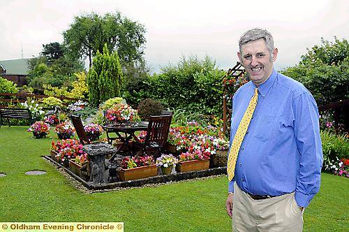 Thomas Adamson in his award winning garden at Burnedge Lane, Grasscroft. 
