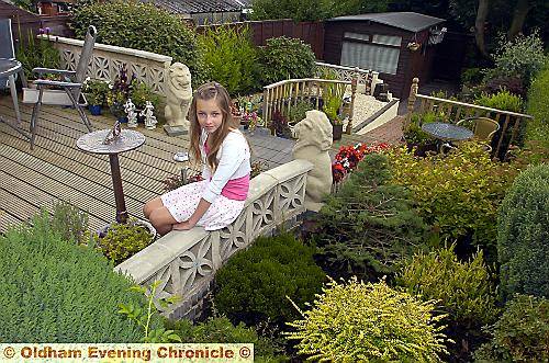 Alexander Best’s granddaughter Nicole Harris at the prize-winnning Hathershaw garden 
