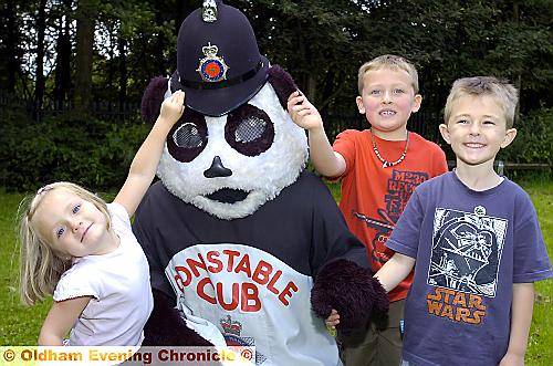 Constable Cub with (from left), Alyssia Fletcher (3),Harry Fletcher (6) and Cameron Fletcher (5). Constable Cub with (from left), Alyssia Fletcher (3),Harry Fletcher (6) and Cameron Fletcher (5).