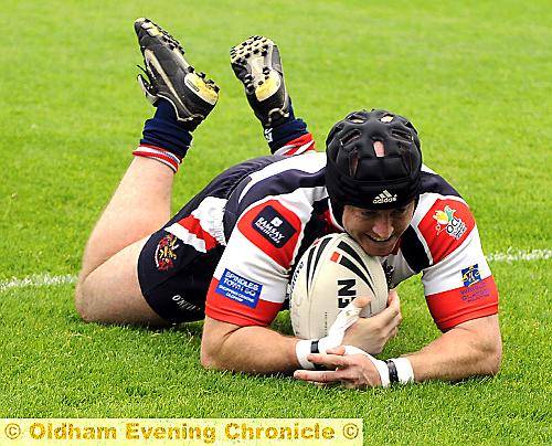 TRYING TIMES: Martin Roden dives in for try number four 