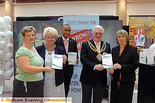 PLEDGE . . . pictured holding road safety pledges in Spindles, are (from left) Road Safety Officer Julie Williams;, Mayoress, Councillor Kay Knox; Youth Mayor Mohammed Adil, Oldham Mayor, Councillor Jim McArdle and Road Safety Officer Tracy Bowers PLEDGE . . . pictured holding road safety pledges in Spindles, are (from left) Road Safety Officer Julie Williams;, Mayoress, Councillor Kay Knox; Youth Mayor Mohammed Adil, Oldham Mayor, Councillor Jim McArdle and Road Safety Officer Tracy Bowers