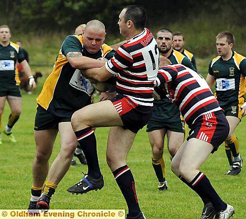HOLDING ON: Oldham St Anne’s prop Alex Eyres (left) retains possession during his side’s 40-22 home defeat to Eccles in division two. HOLDING ON: Oldham St Anne’s prop Alex Eyres (left) retains possession during his side’s 40-22 home defeat to Eccles in division two.