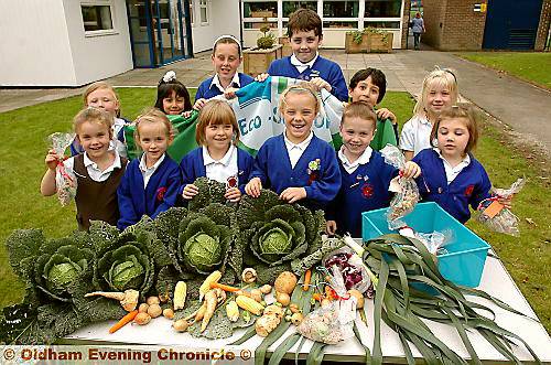WHITEGATE END pupils show off their produce 
