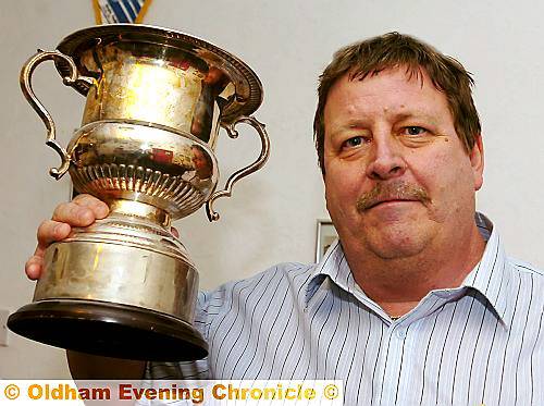 dedication . . . Keith Dennis, pictured with the John Tebbitt Memorial Trophy. dedication . . . Keith Dennis, pictured with the John Tebbitt Memorial Trophy.