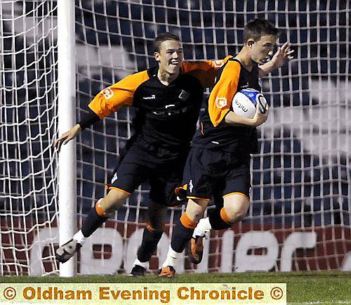 LET’S GO.. Andy Crompton (right) turns away after scoring Athletic’s second goal against Bury last night. LET’S GO.. Andy Crompton (right) turns away after scoring Athletic’s second goal against Bury last night.