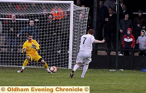 RAY OF HOPE . . . Steve Settle scores for Mossley to reduce the Lilywhites’ arrears to 3-2. 
